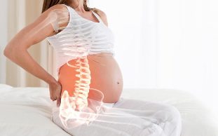 Back pain in pregnancy causes